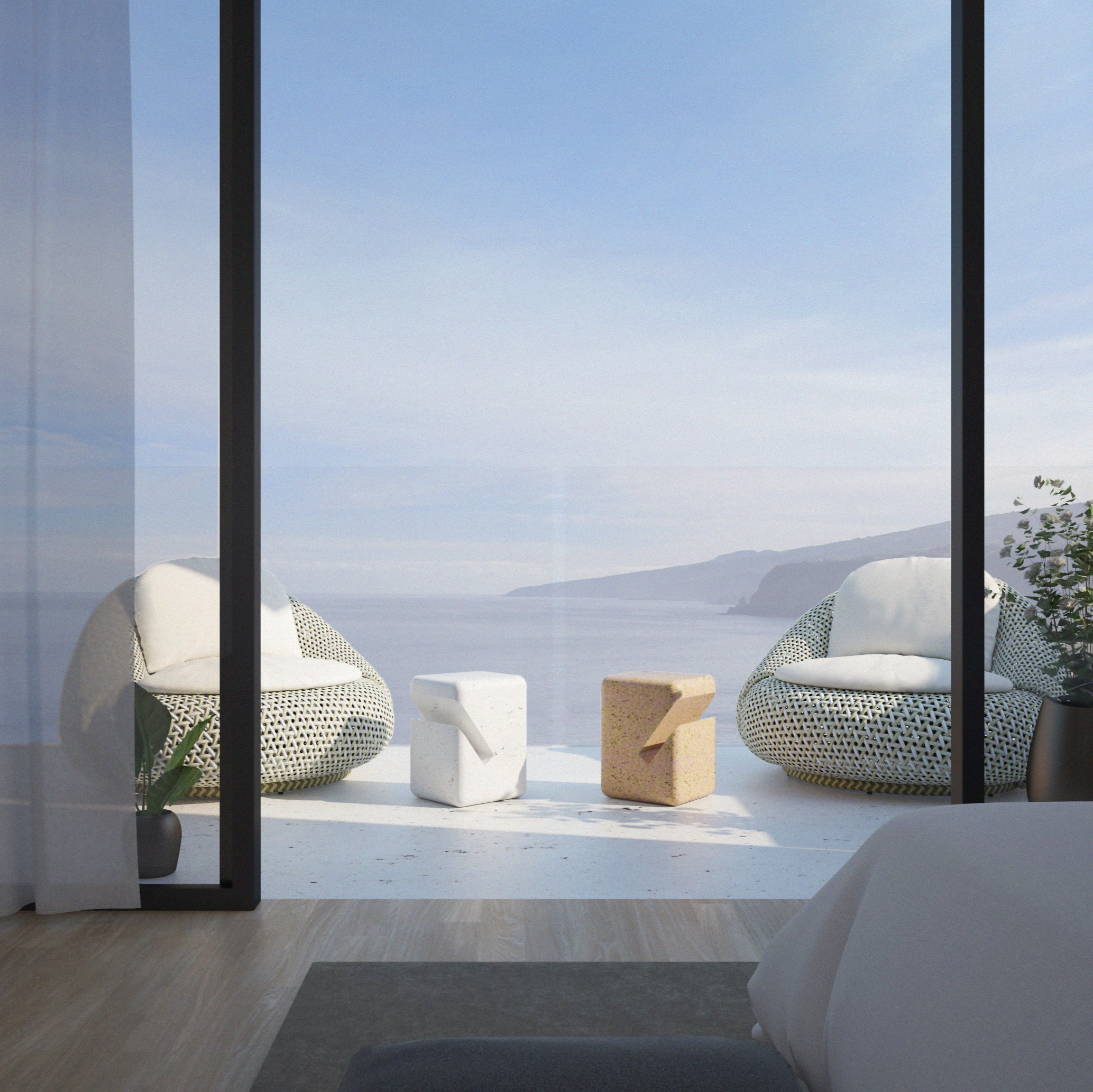 Outdoor balcony seating with concrete side tables and sea view