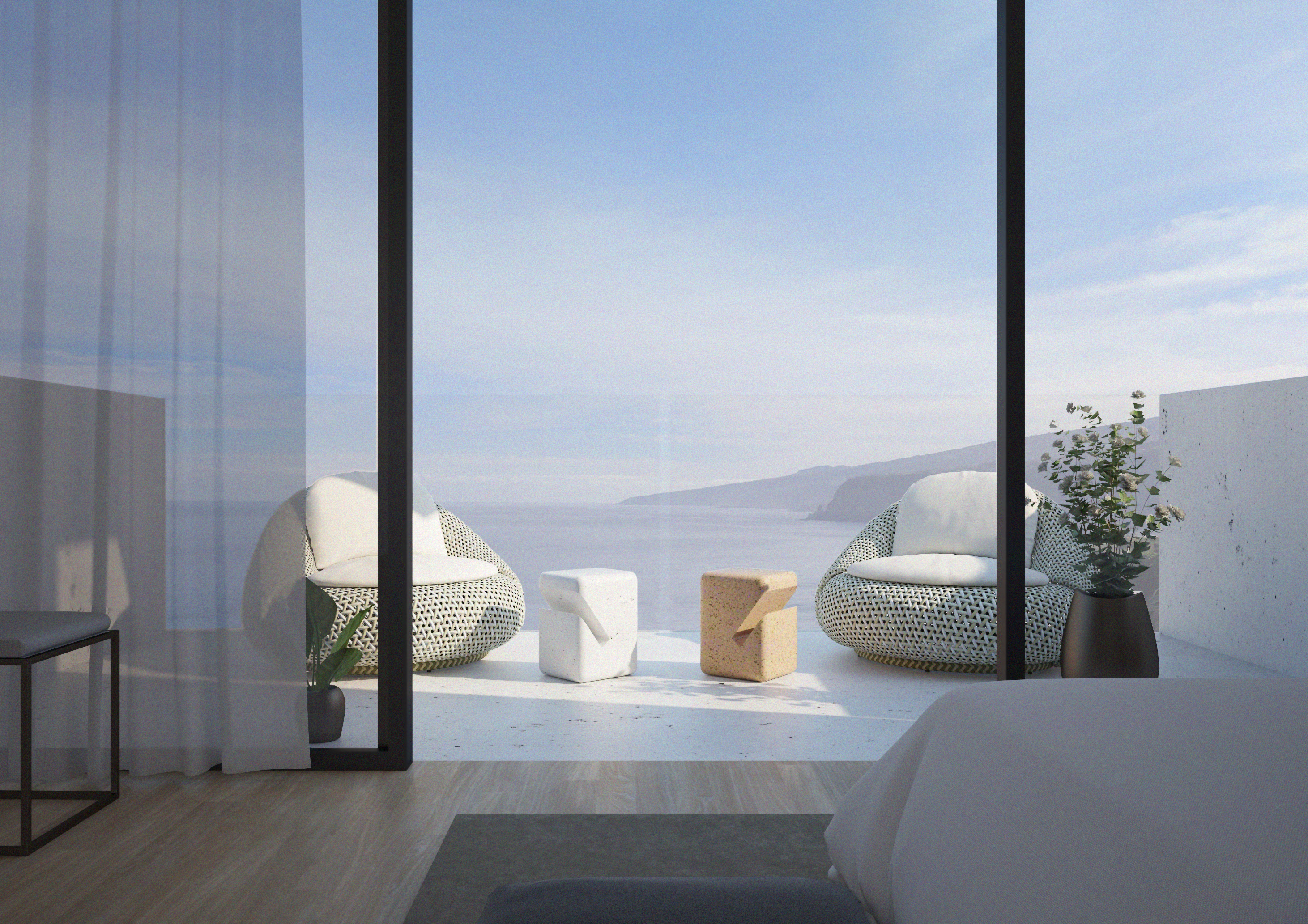 Outdoor balcony seating with concrete side tables and sea view