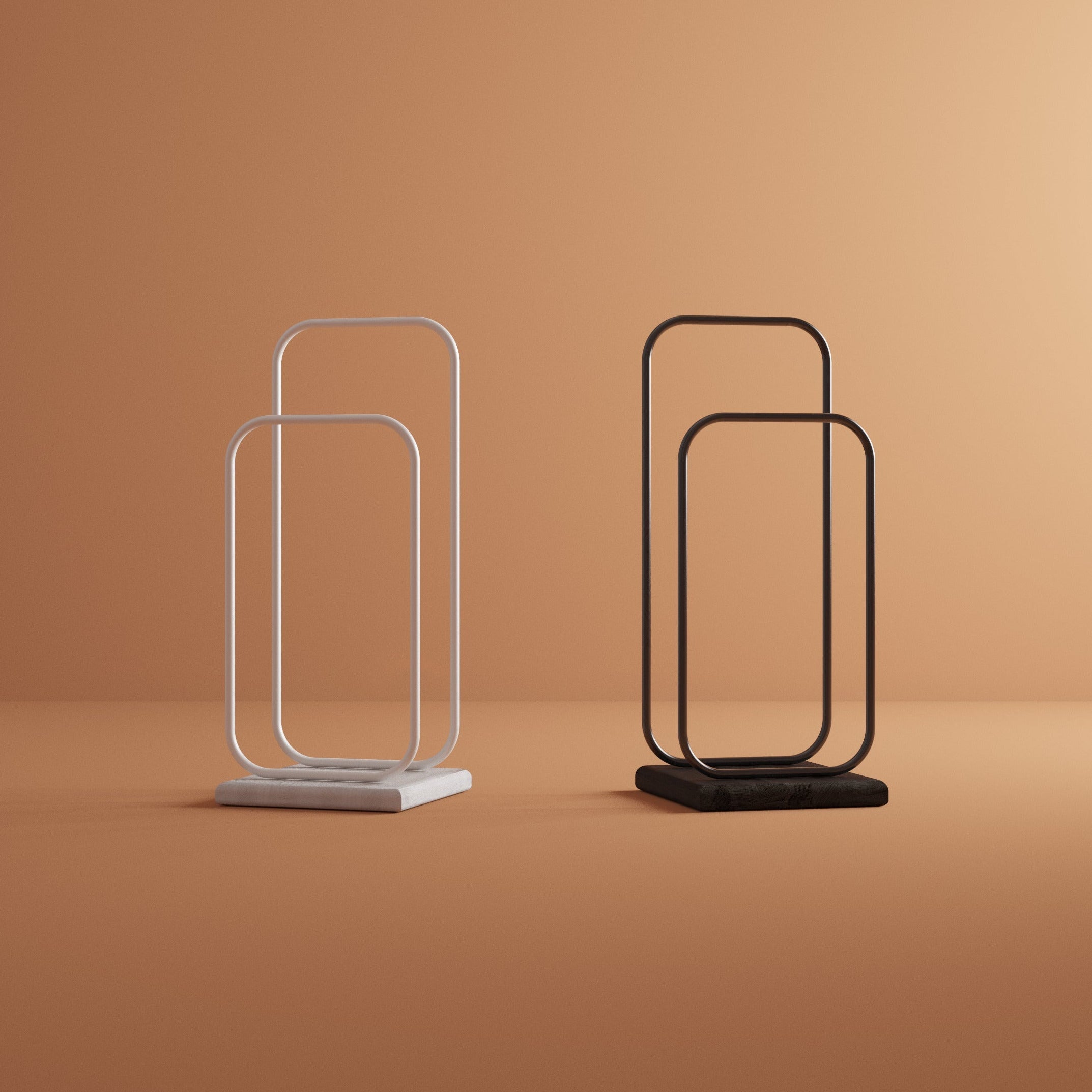 modern valet stand in black and white on orange background