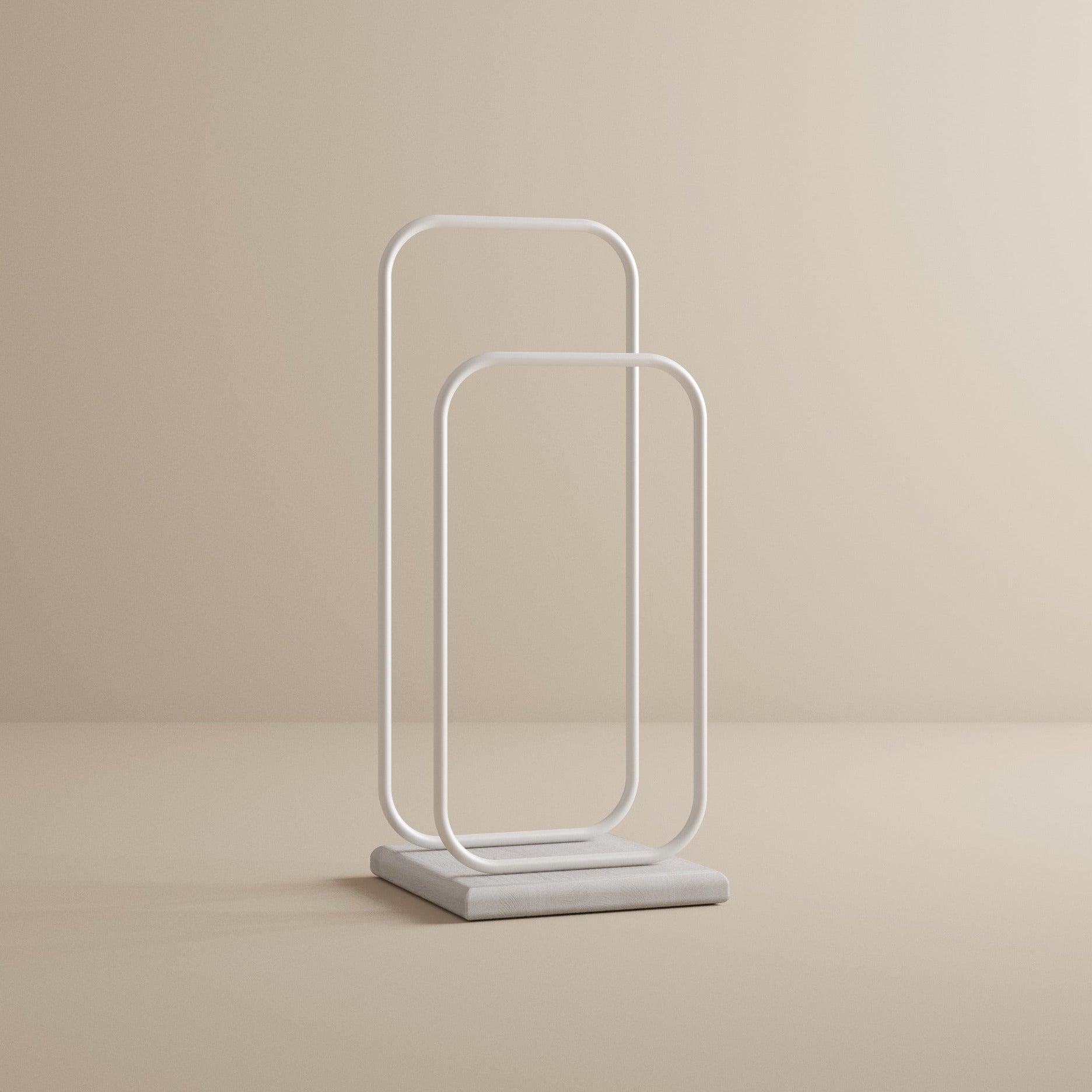 Modern white valet stand on beige background