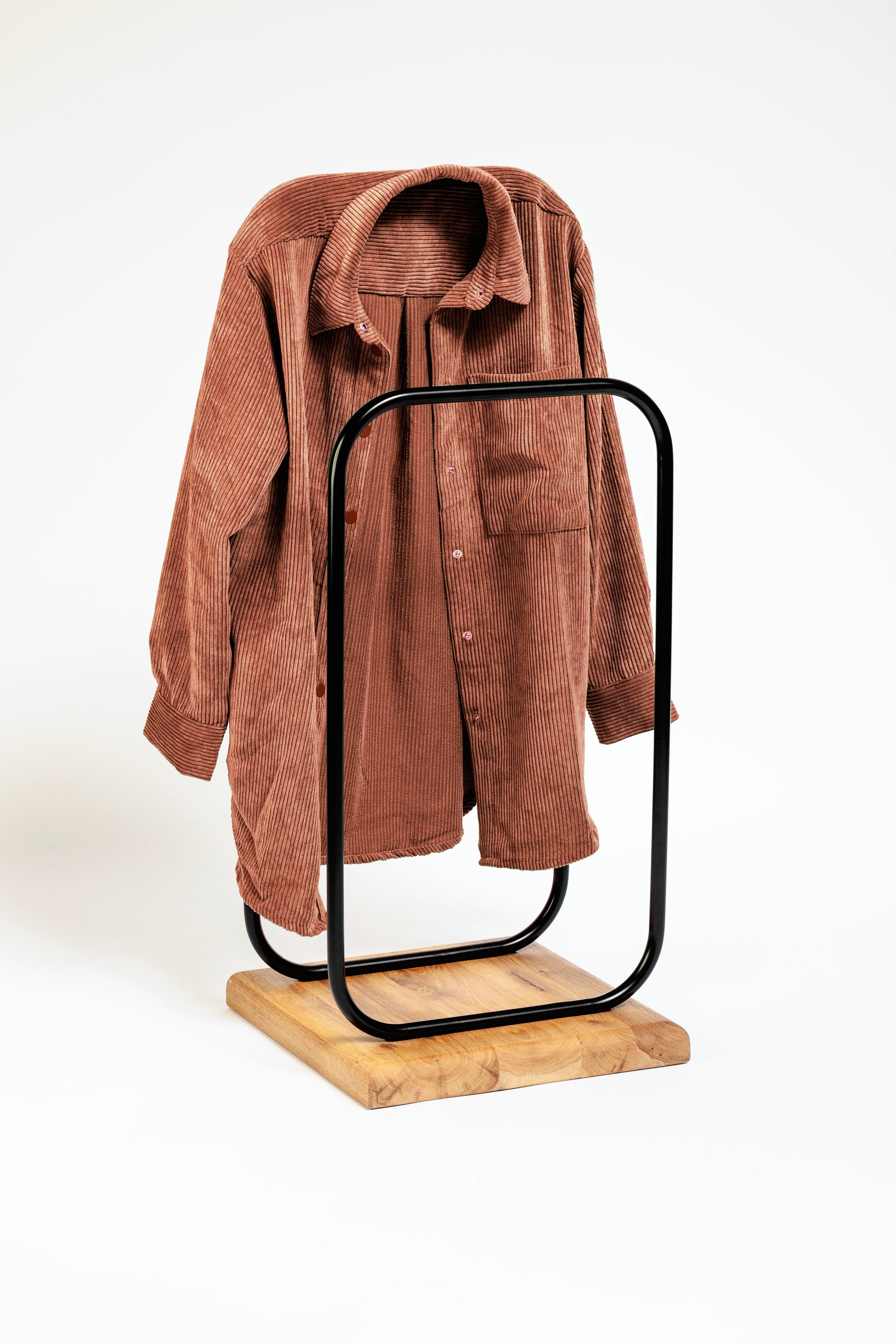 black metal coat stand with a wooden base 